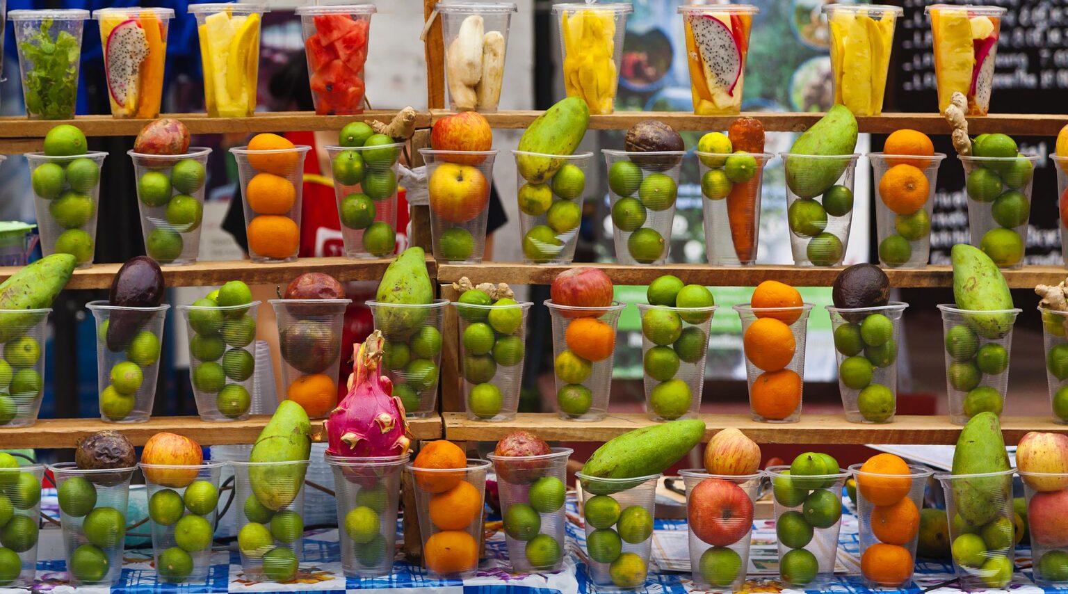 Fresh fruit for sale including mango, oranges, apples, pineapple, watermelon and banana - LUANG PRABANG, LAOS