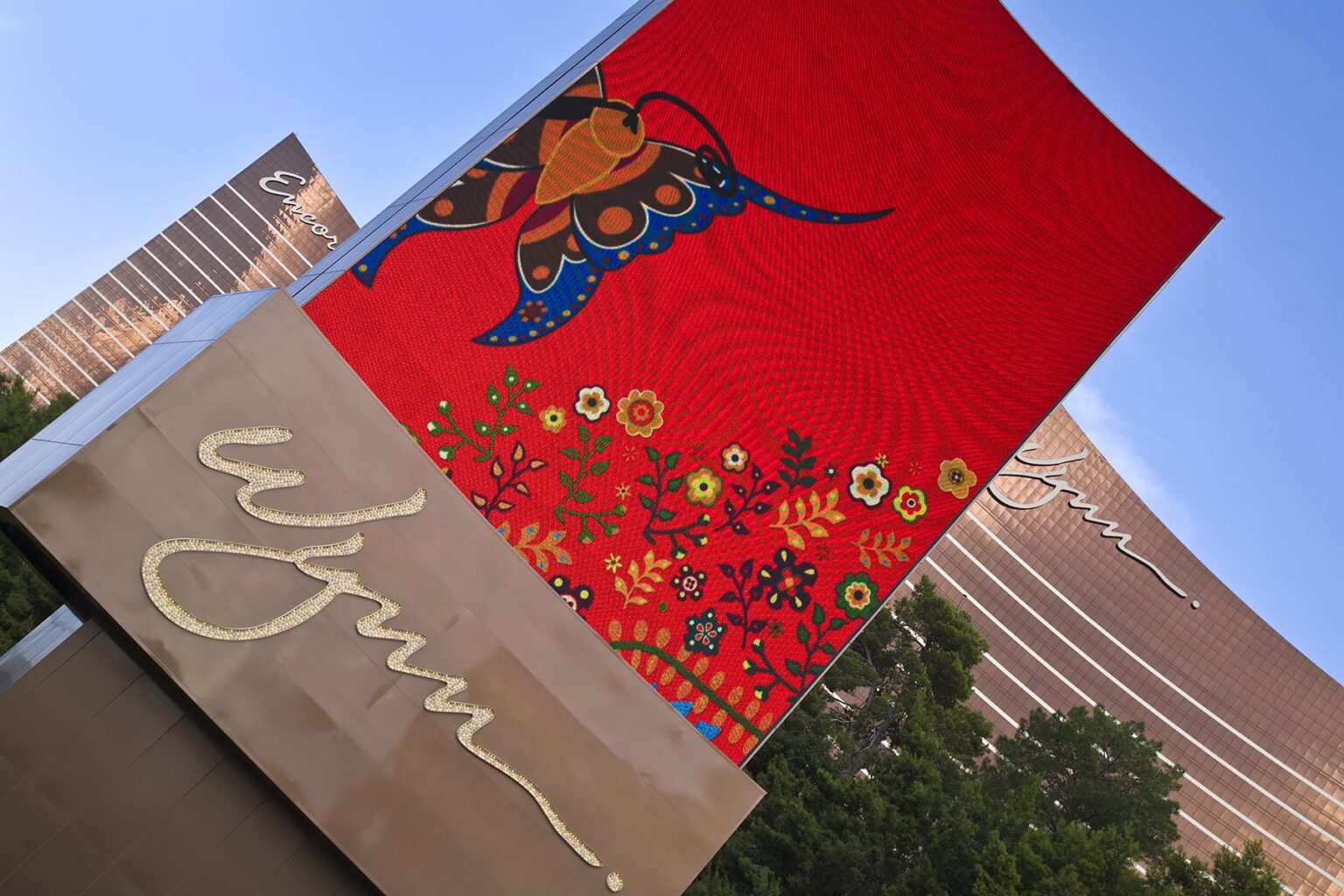 NEON SIGN and the exterior of the WYNN HOTEL and CASINO - LAS VEGAS, NEVADA
