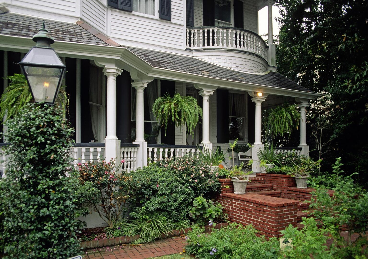 PORCH & garden of a Southern Style MANSION in the GARDEN DISTRICT - NEW ORLEANS, LOUISIANA