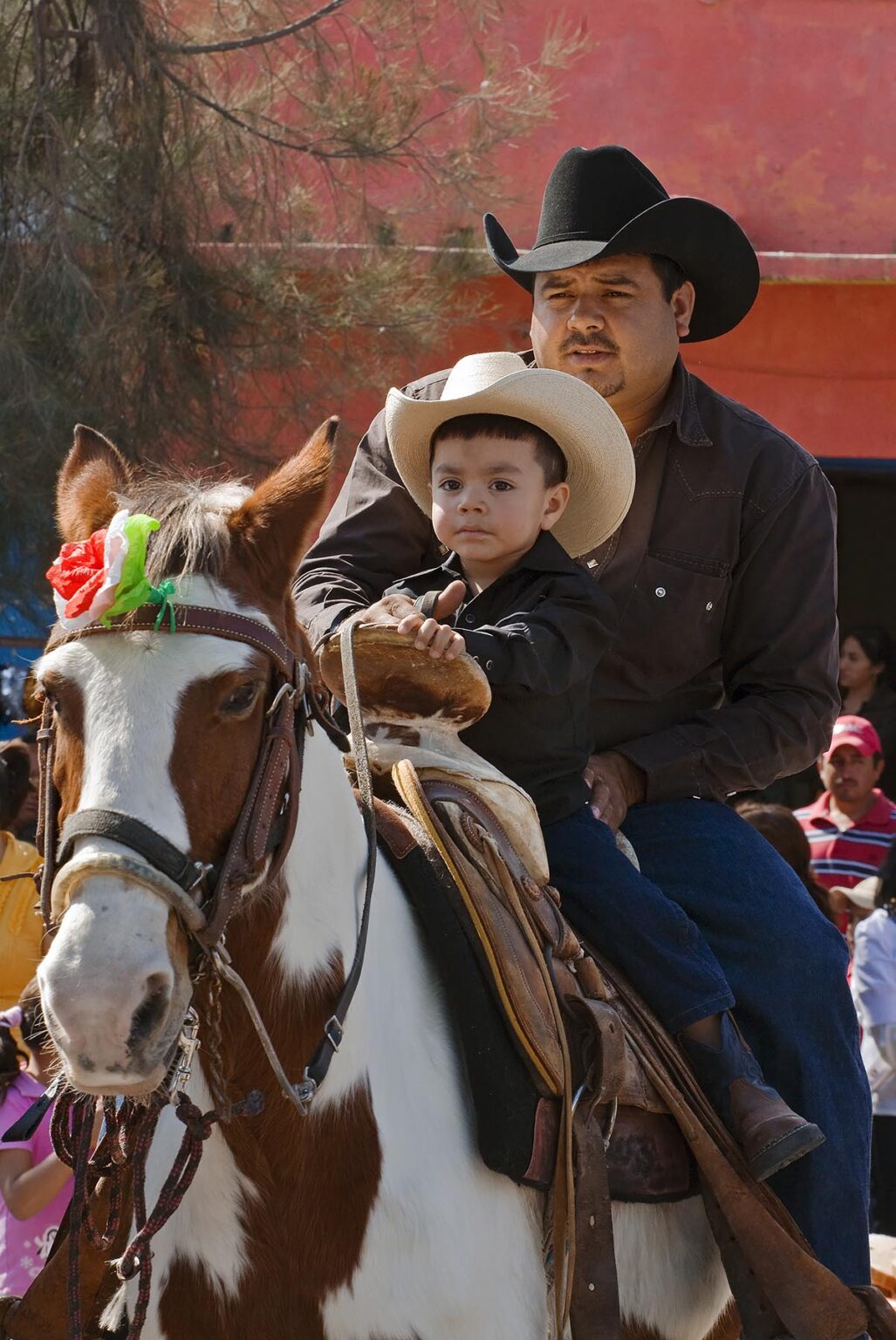 CABALLEROS or Mexican cowboys both young and old ride into town to celebrate the festival of the VIRGIN OF GUADALUPE - LOS RODRIGUEZ, GUANAJUATO, MEXICO
