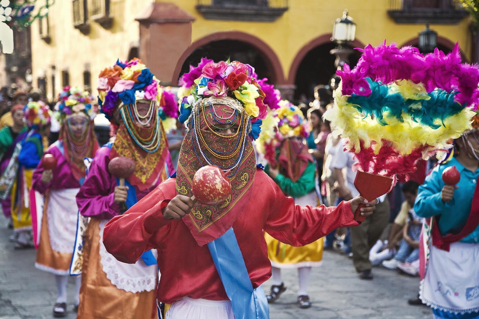 Dance troupes come from all parts of Mexico representing their tribe in the annual INDEPENDENCE DAY PARADE in September - SAN MIGUEL DE ALLENDE, MEXICO