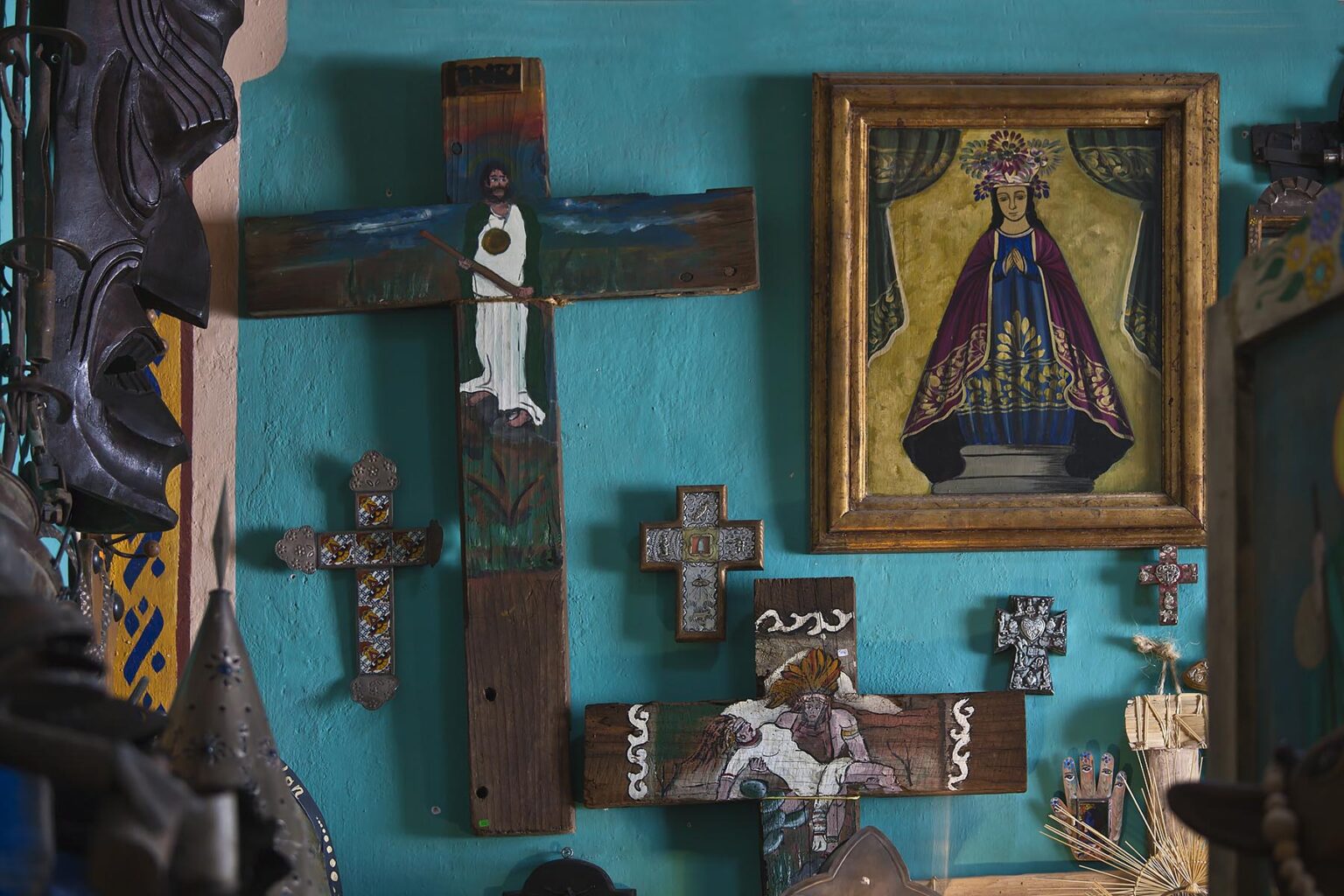 CATHOLIC CROSSES and a Christian painting in a shop - MINERAL DE POZOS,  GUANAJUATO, MEXICO