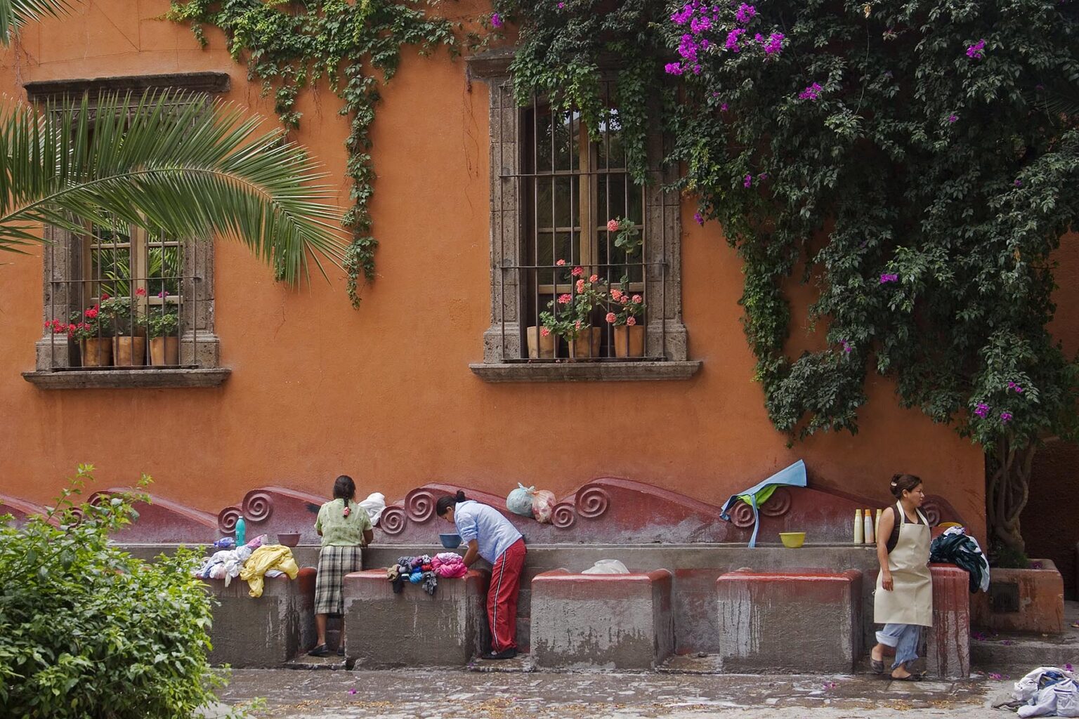 Mexican women still use the historic outdoor washing area to do their laundry in San Miguel de Allende - MEXICO