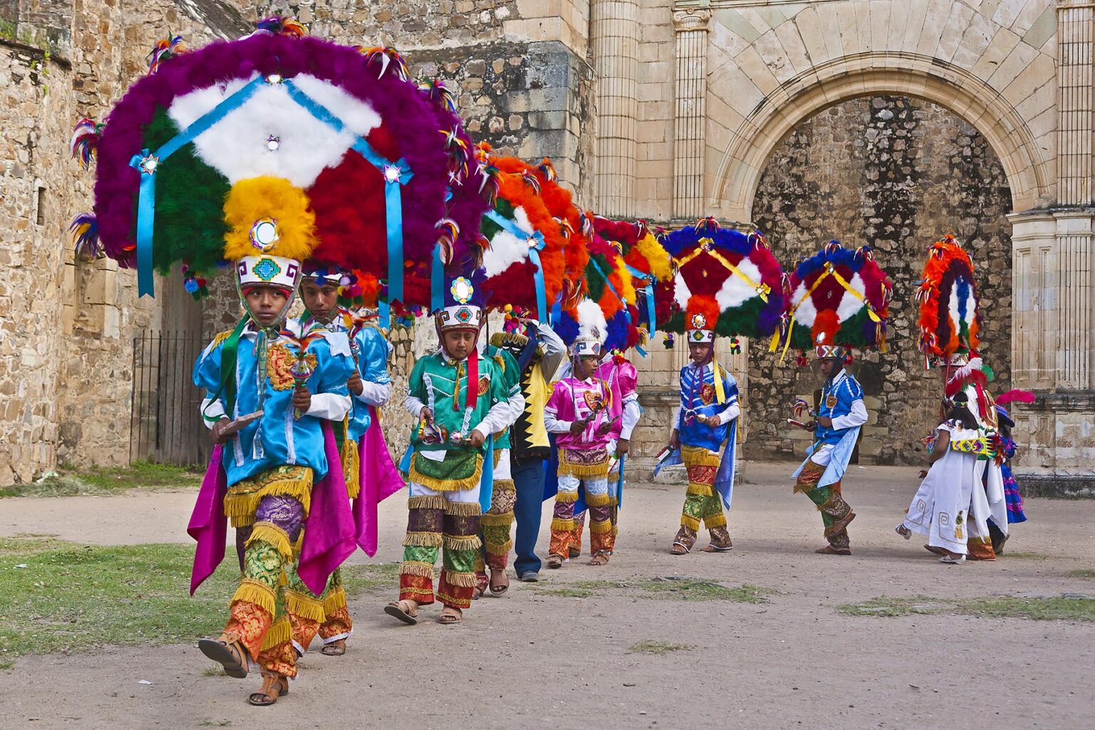 DANCERS reenact ZAPOTEC history during the GUELAGUETZA FESTIVAL - CUILAPAN, MEXICO near OAXACA