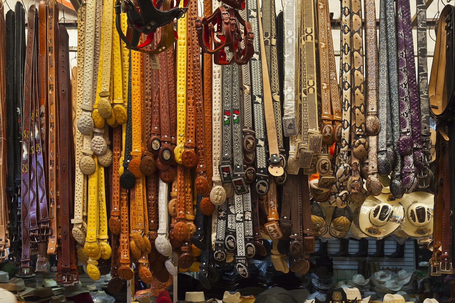 BELTS made from animal skins and for sale in the massive MERCADO DE ABASTO - OAXACA, MEXICO