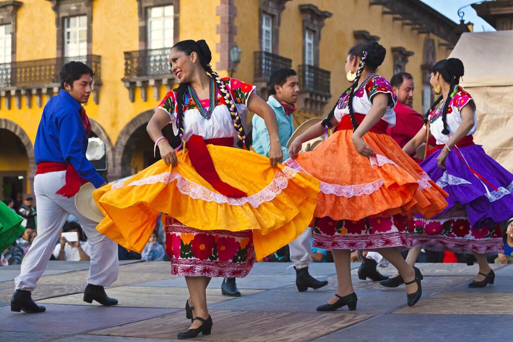 DANCERS perform in the Jardin or Central Square during the annual FOLK DANCE FESTIVAL - SAN MIGUEL DE ALLENDE, MEXICO