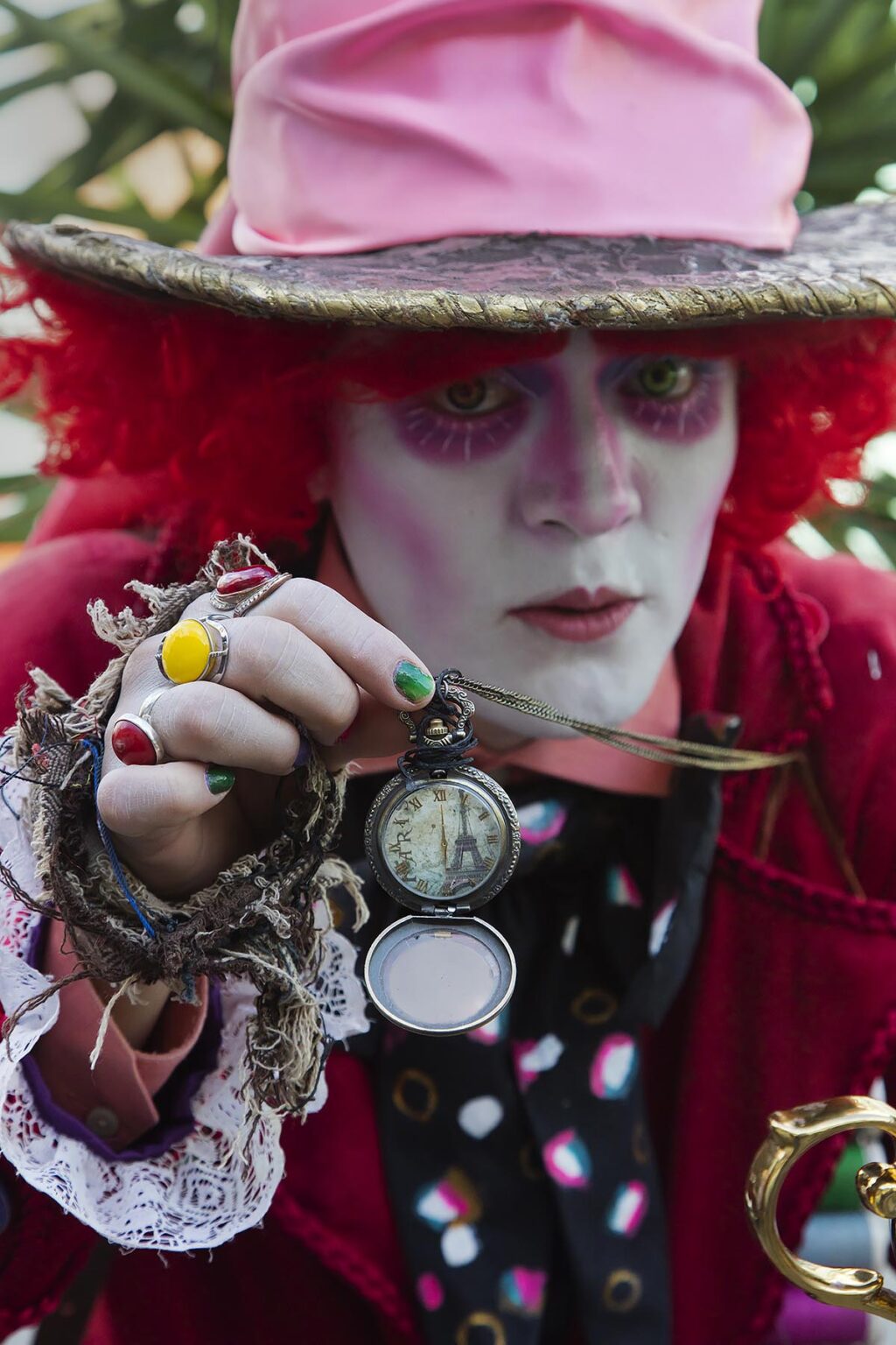 A street performer dressed as THE MAD HATTER of ALICE IN WONDERLAND during the Cervantino Festival - GUANAJUATO, MEXICO