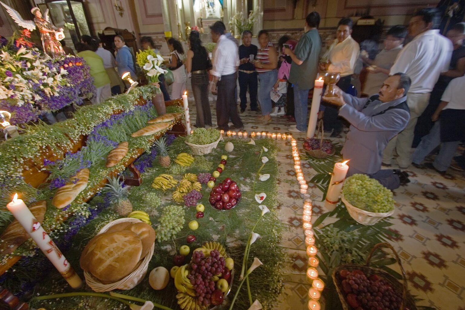 EASTER shrine of food and flowers in TEMPLO DEL ORATORIO DE SAN FELIPE NERI - SAN MIGUEL DE ALLENDE, MEXICO
