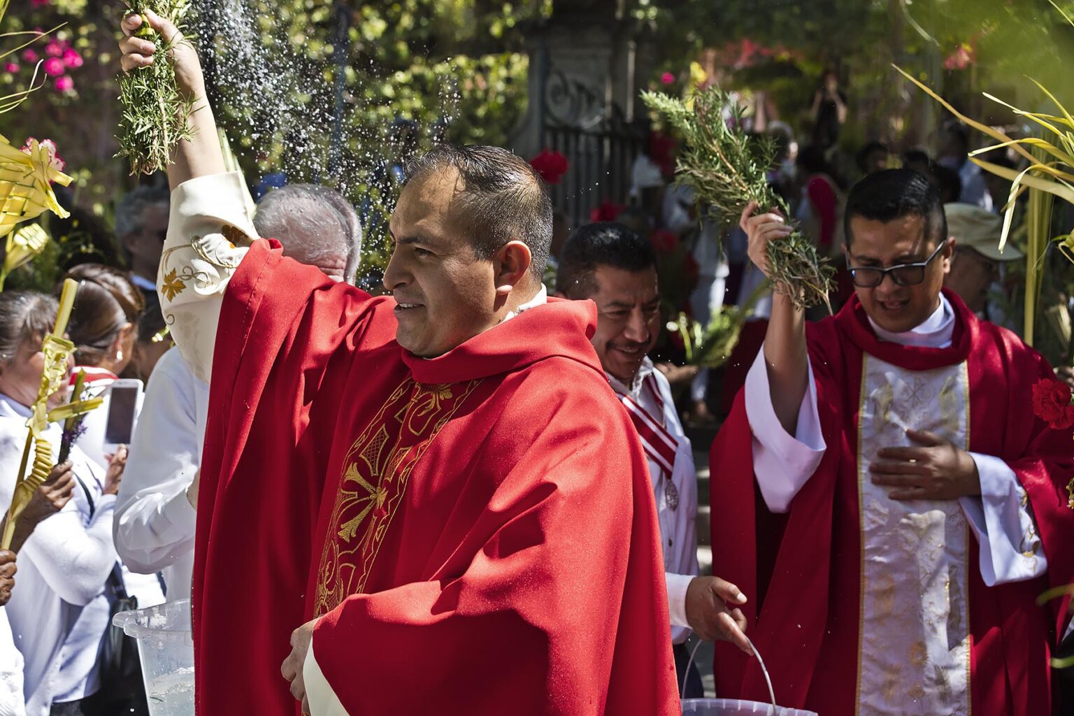 Mexicans line up for a blessing at the start of the PALM SUNDAY procession from Parque Juarez to the Jardin - SAN MIGUEL DE ALLENDE, MEXICO