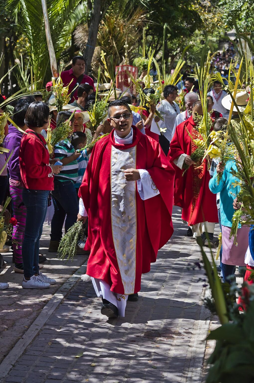Mexicans line up for a blession at the start of the PALM SUNDAY procession from Parque Juarez to the Jardin - SAN MIGUEL DE ALLENDE, MEXICO