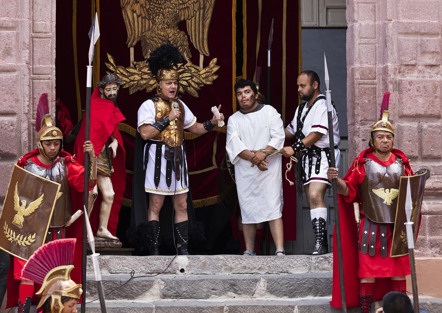 ROMAN SOLDIERS and PONTIUS PILATE in a reenactment on the steps of the SAN RAFAEL chapel start the Good Friday Procession Santo Encuentro - SAN MIGUEL DE ALLENDE, MEXICO