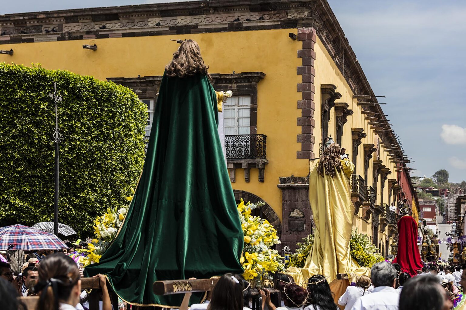 A statue of a saint is carried out of the SAN RAFAEL chapel into the JARDIN during the Good Friday Procession called Santo Encuentro - SAN MIGUEL DE ALLENDE, MEXICO