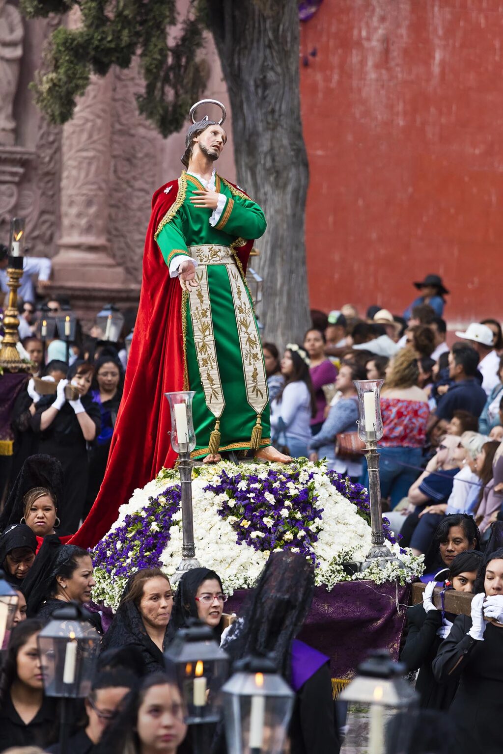 A statue of a saint is carried in the Good Friday Procession, known as the Santo Entierro, from the ORATORIO CHURCH - SAN MIGUEL DE ALLENDE, MEXICO