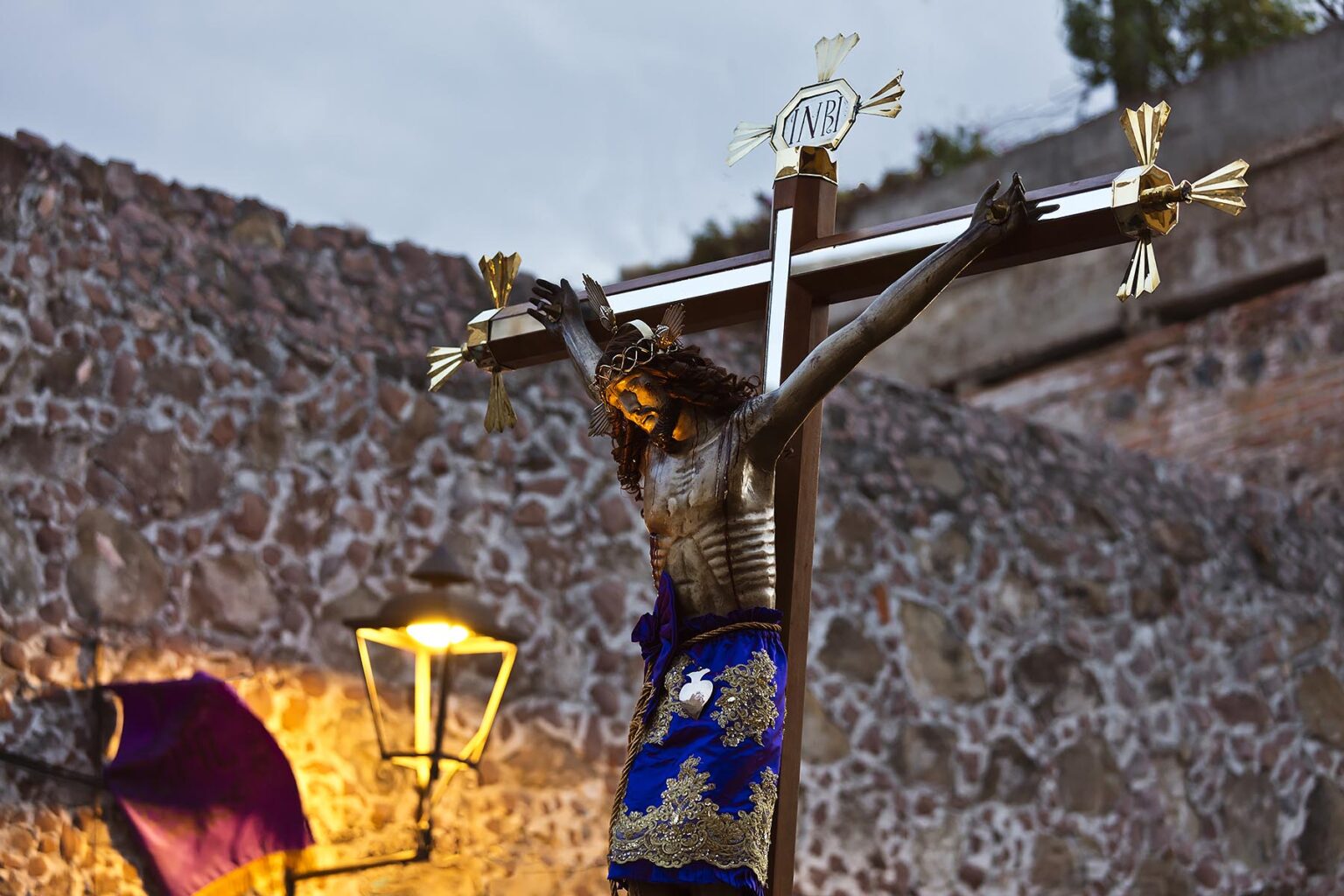 A statue of JESUS ON THE CROSS is carried in the Good Friday Procession, known as the Santo Entierro, from the ORATORIO CHURCH - SAN MIGUEL DE ALLENDE, MEXICO