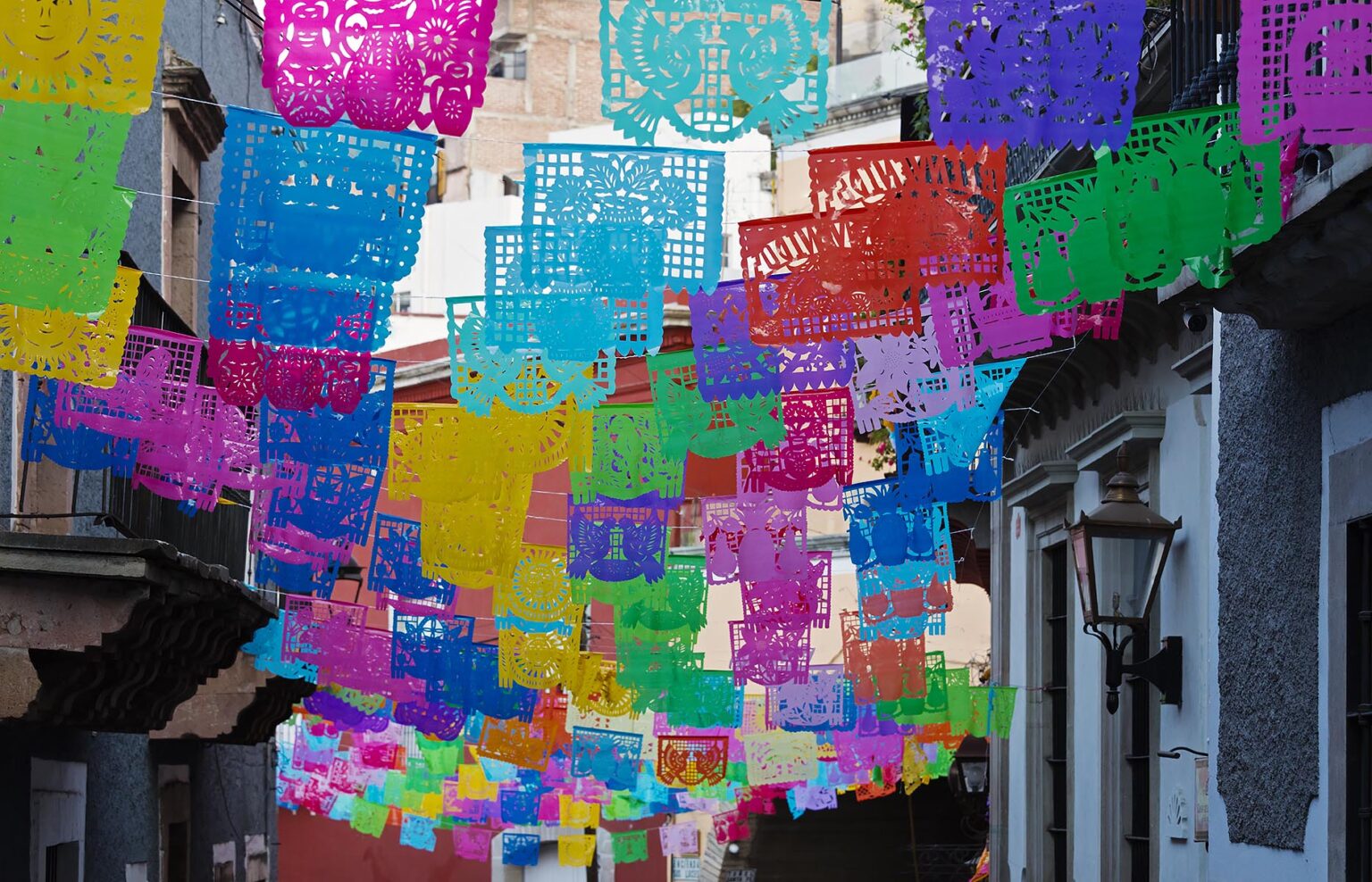 Paper cutout flags decorate the streets during EASTER WEEK - GUANAJUATO, MEXICO