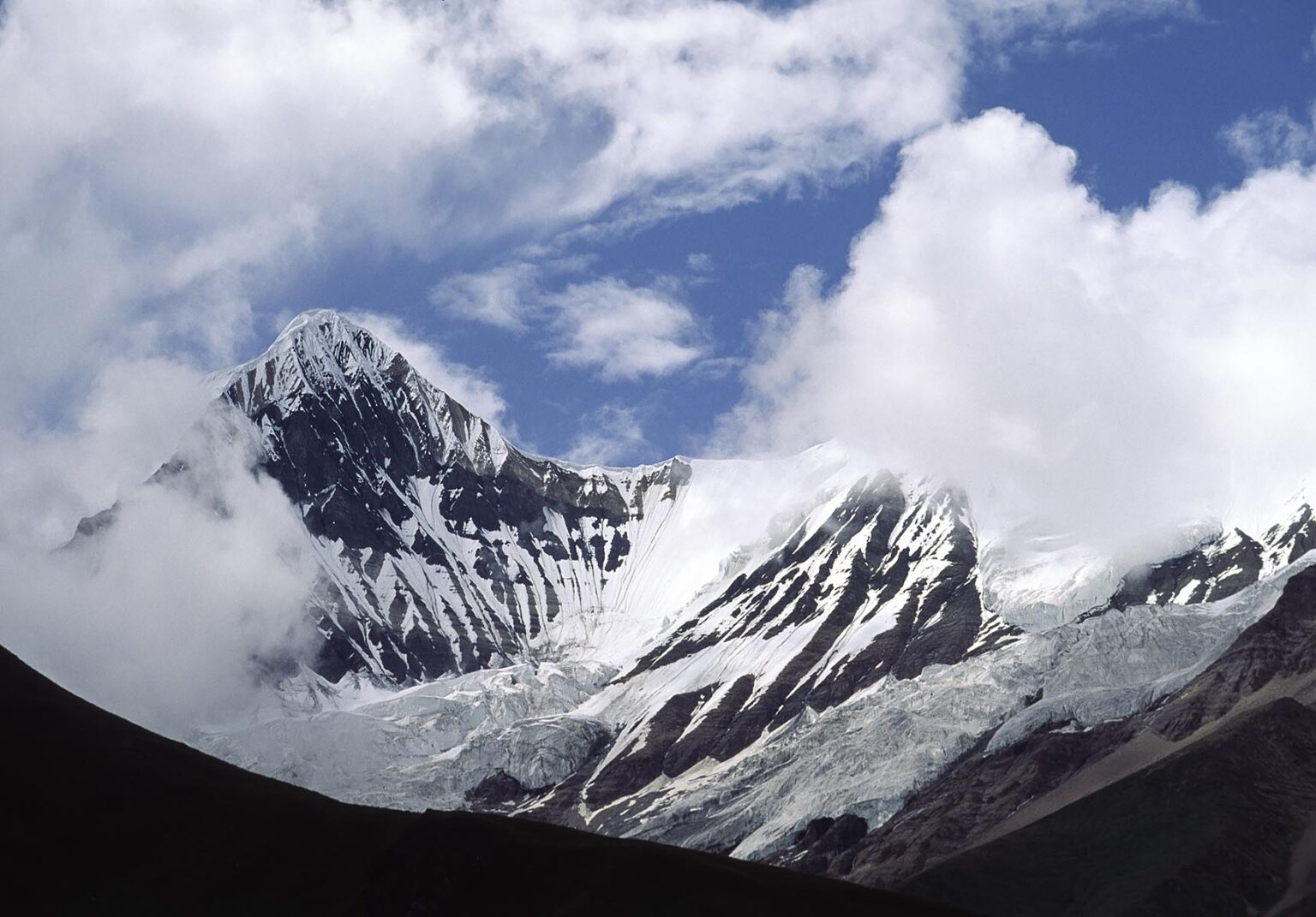 KANG CHUNNE PEAK rises to 6443 meters above barren HIMALAYAN hillsides - DOLPO DISTRICT, NEPAL