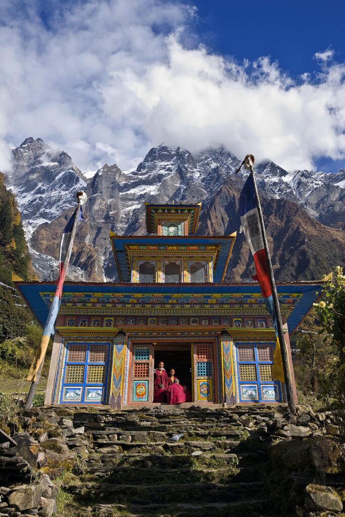 A TEMPLE and HIMALAYAN PEAKS at a remote TIBETAN BUDDHIST MONASTERY - NEPAL HIMALAYA