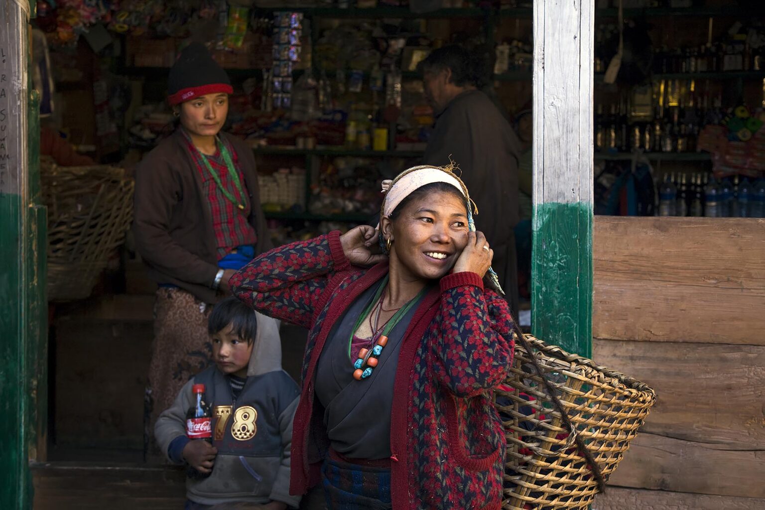 Villagers in LHO village at a local store on the Around Manaslu Trek - NUPRI REGION, NEPAL