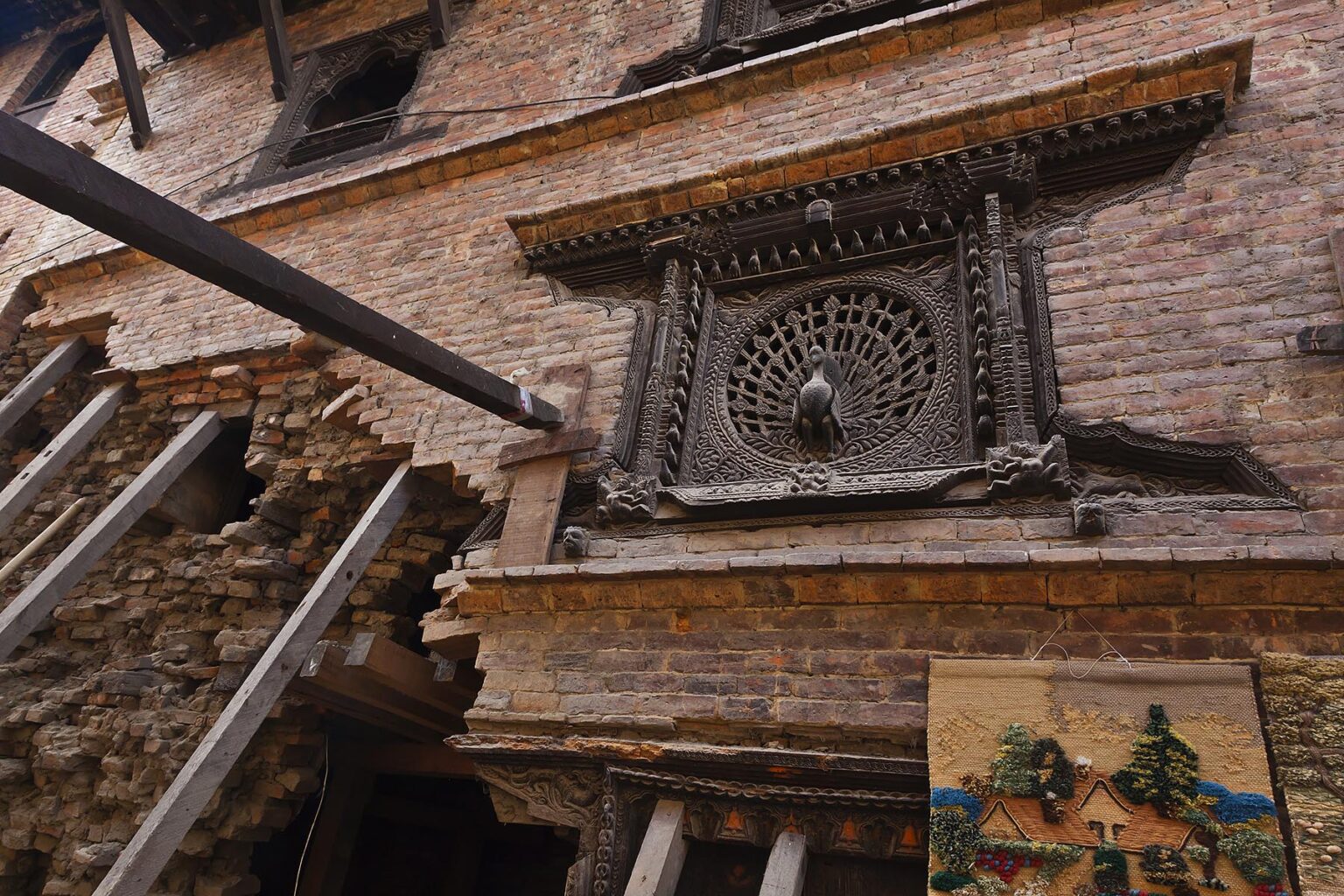 The traditional town of BHAKTAPUR which was severely damaged by the 2015 earthquake including the famous PEACOCK WINDOW - NEPAL