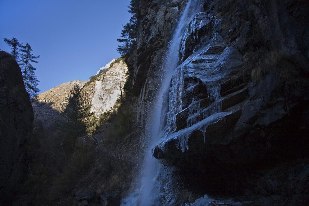 A FROZEN WATERFALL which drains into the NAR PHU RIVER  in the ANNAPURNA CONSERVATION AREA - NEPAL HIMALAYA