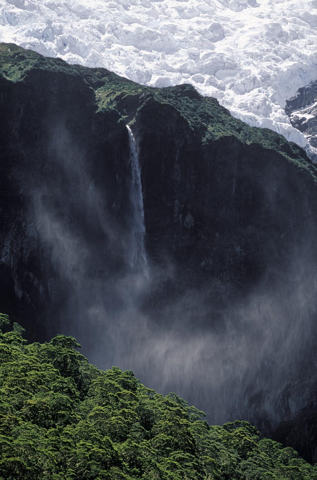 Waterfall drops off of MT ROY & the ROB ROY GLACIER - WANAKA region, SOUTH ISLAND