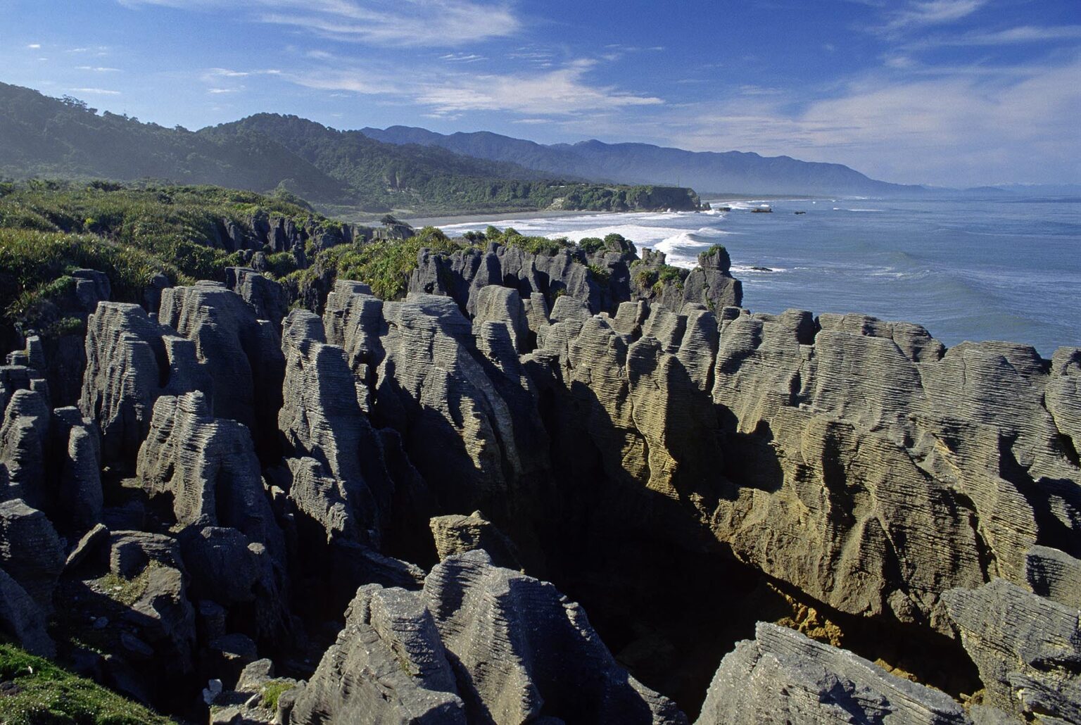 These are the famous PANCAKE ROCKS located on PUNAKAIKI'S spectacular coastline - SOUTH ISLAND, NEW ZEALAND