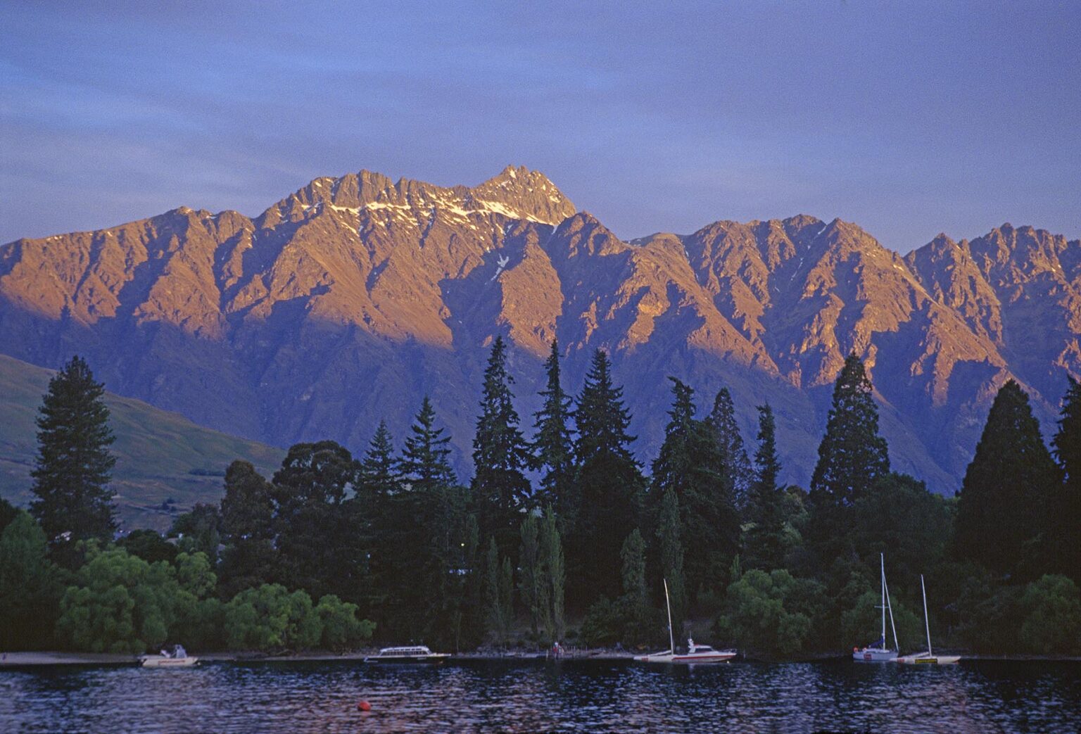 The sunsets on the Remarkables and Lake Wakatipu in Queenstown - South Island, New Zealand