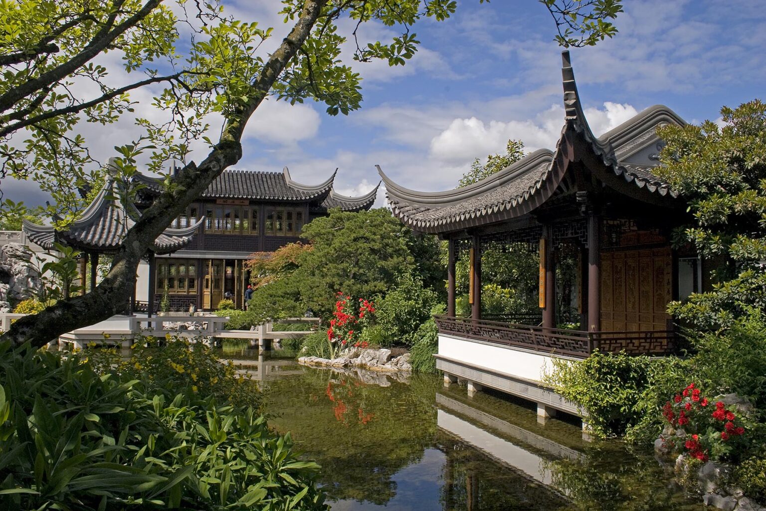 Two pavilions and the Tea House sits across Zither Lake at the Portland Classical Chinese Garden, an authentically built Ming Dynasty style garden - PORTLAND, OREGON