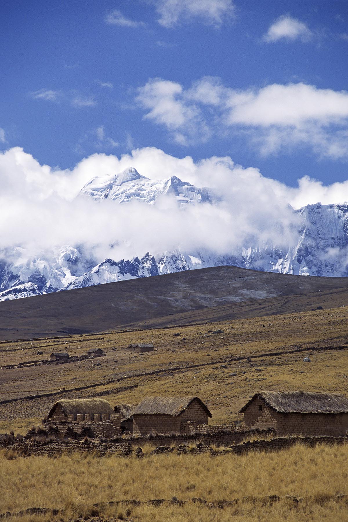 Adobe farm houses on the high ALTIPLANO on the  Nevado Auzangate circuit - PERUVIAN ANDES