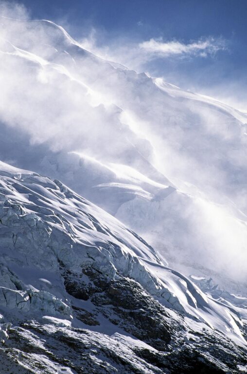 The wind howls off a GLACIER on AUZANGATE'S Southern Ridge - PERUVIAN ANDES