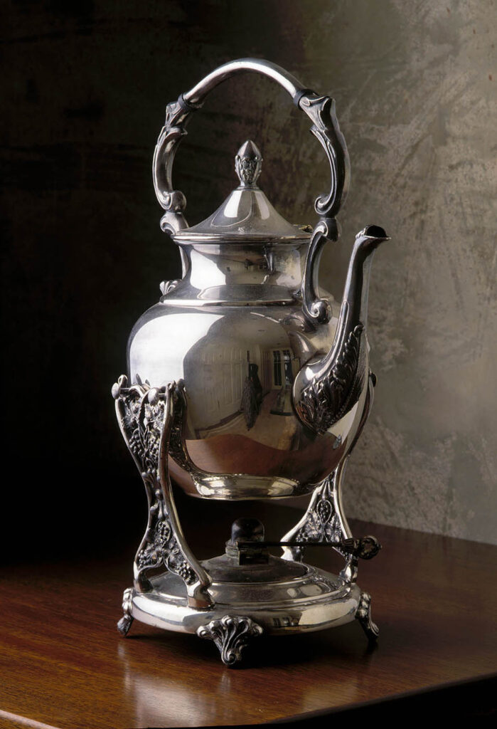 ANTIQUE SILVER TEA POT photographed for a magazine spread.  Product photography by Craig Lovell
