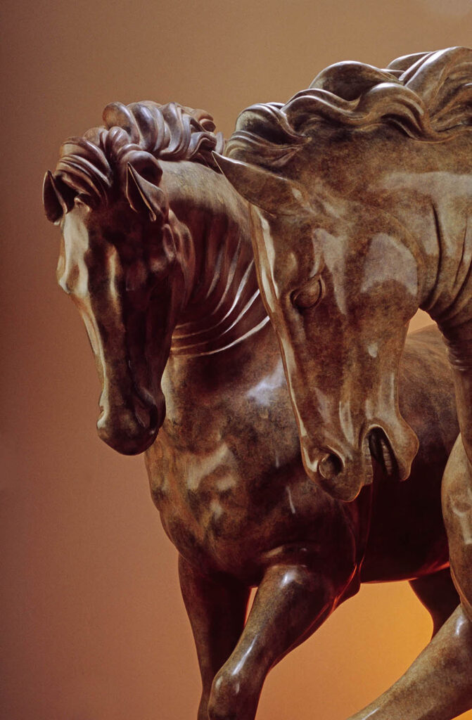 Sculpture of BRONZE HORSES for sale in a CARMEL GALLERY. Product photography by Craig Lovell