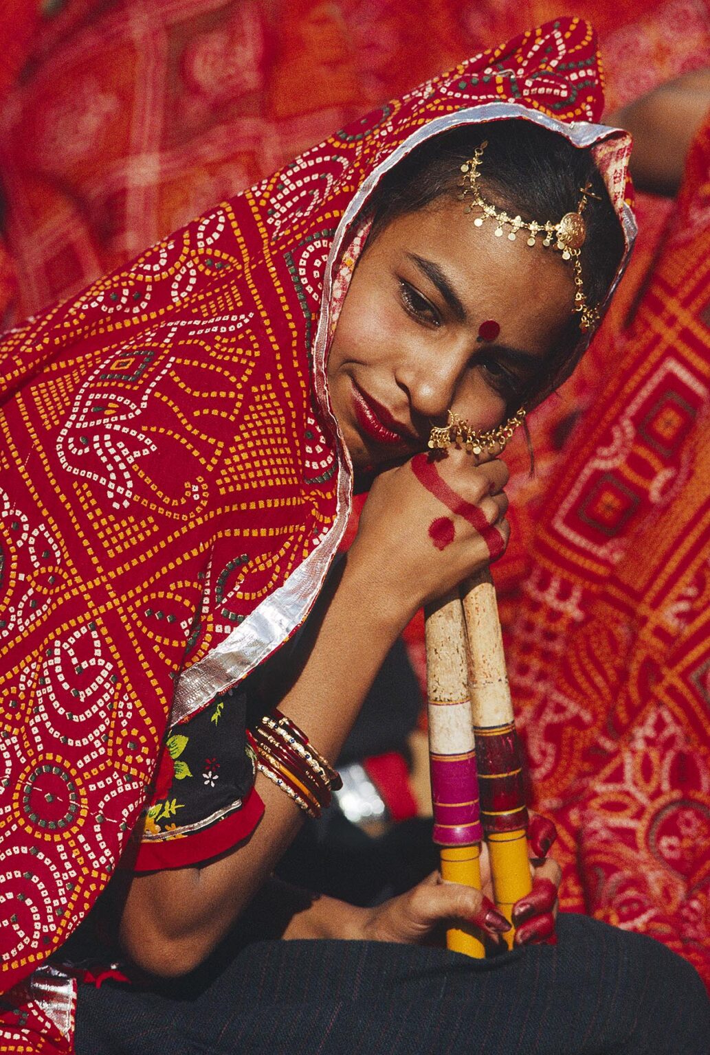 Portrait of a RAJASTHANI GIRL during a TRADITIONAL DANCE performance at the PUSHKAR CAMEL FAIR - RAJASTHAN, INDIA