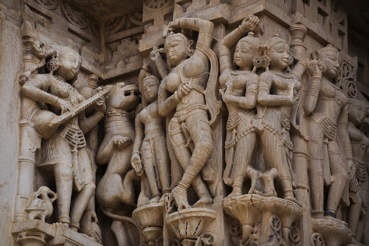 Carved MUSICIAN and APSARAS decorate the JAGADISH TEMPLE which was built in 1651by Maharaja Jagat Singh in honor of Vishnu as Jagannath - UDAIPUR, RAJASTHAN, INDIA