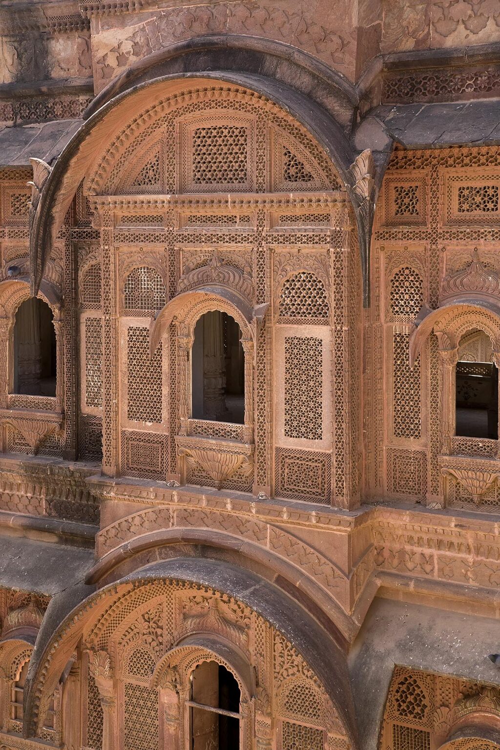 Stone carved windows at the MEHERANGARH FORT built by Maharaja Man Singh in 1806 - RAJASTHAN, INDIA