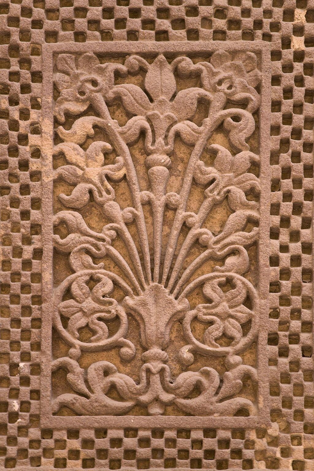 Stone carved flowers in the HOLI CHOWK COURTYARD in the MEHERANGARH FORT built by Maharaja Man Singh in 1806 - JOHDPUR, RAJASTHAN, INDIA