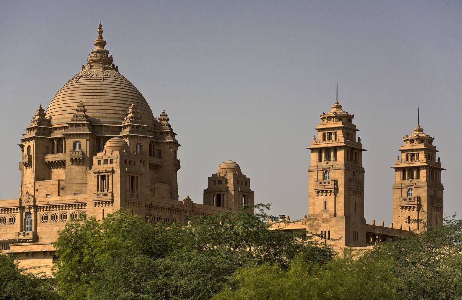 Exterior of UMAID BHAWAN PALACE made of chittar sandstone was built in 1929 and created work in a depressed time - JODHPUR, RAJASTHAN, INDIA