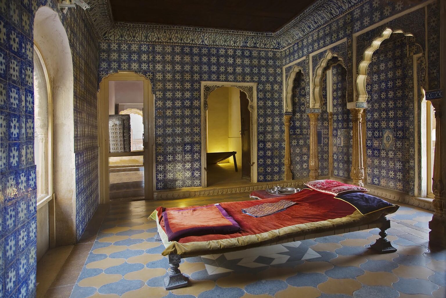 Dutch tiles decorate the walls of the sleeping quarters inside the MAHARAJA'S PALACE located inside JAISALMER FORT - RAJASTHAN, INDIA