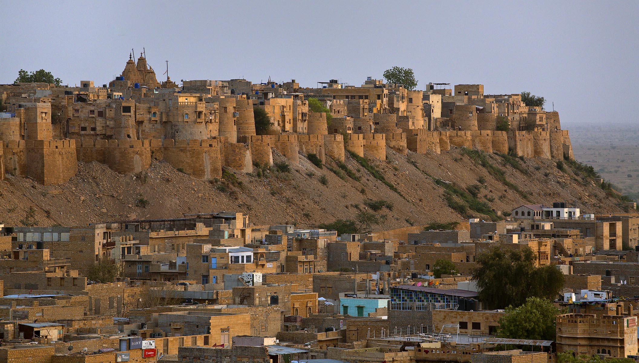 Dusk over the GOLDEN CITY of JAISALMER with JAISALMER FORT and its 99 bastions which was built in 1156 on TRIKUTA HILL - RAJASTHAN, INDIA
