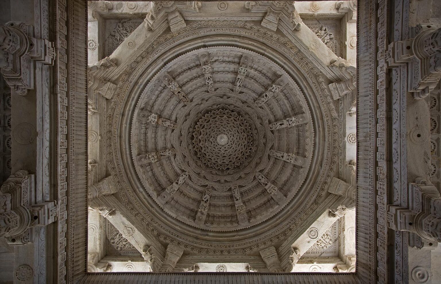 Intricately carved white marble CUPOLA inside the CHAUMUKHA MANDIR TEMPLE at RANAKPUR in the Pali District of RAJASTHAN near Sadri - INDIA