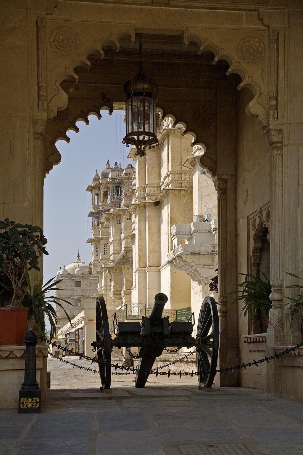 A cannon guards the TRIPOLIA GATE where one enters the CITY PALACE of UDAIPUR built by various Maharajas starting in 1600 AD - RAJASTHAN, INDIA