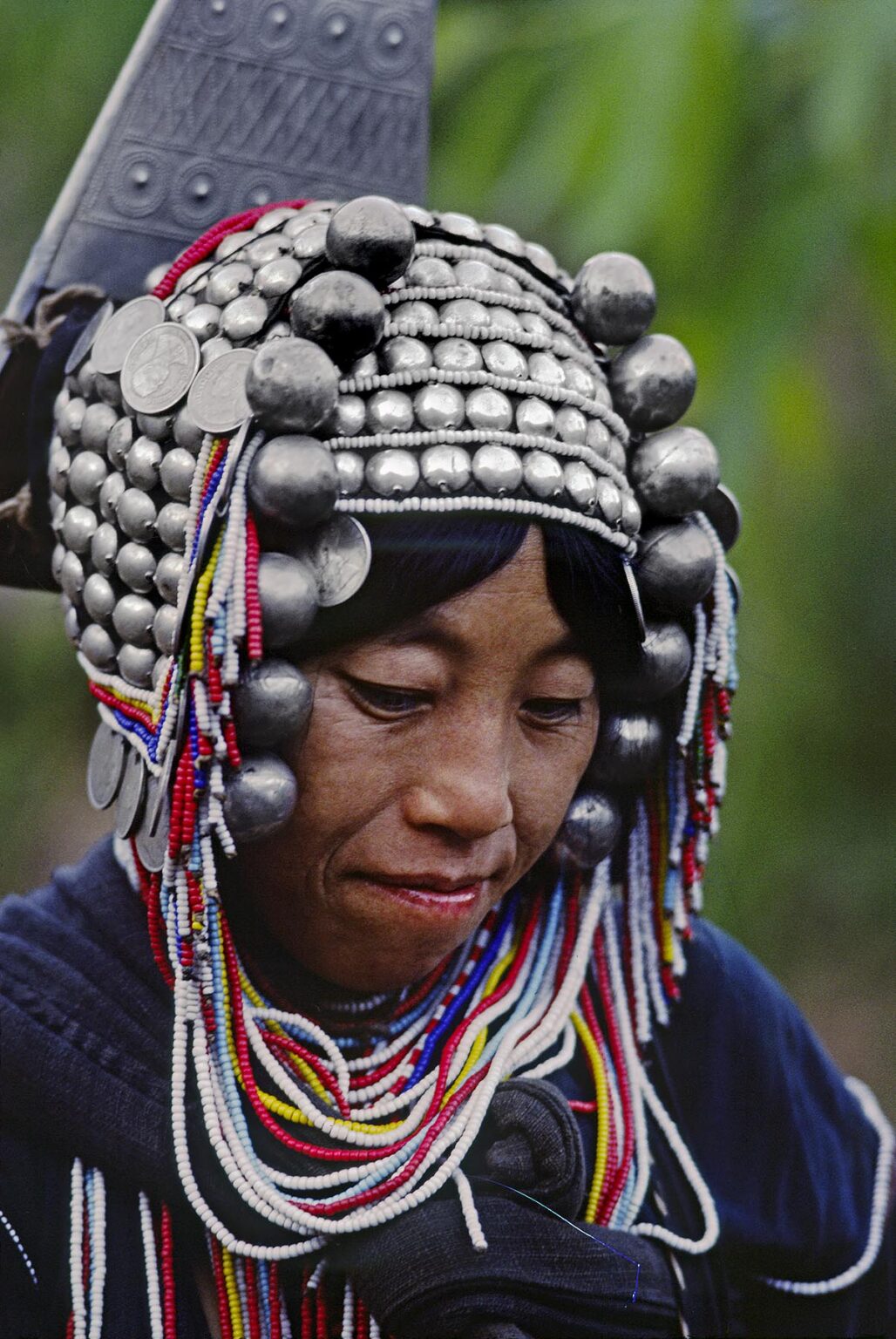 AKHA TRIBAL WOMAN wearing the traditional SILVER HEAD DRESS - NORTHERN, THAILAND