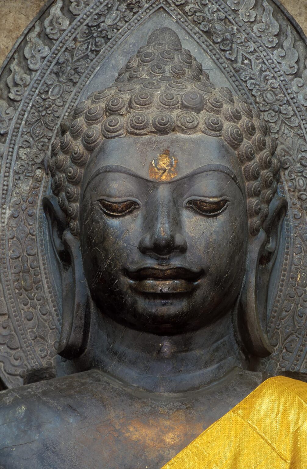 Green stone DAVARAVATI BUDDHA, a masterpiece of MON BUDDHIST ART at WAT NA PRAMAN - AYUTTHAYA, THAILAND