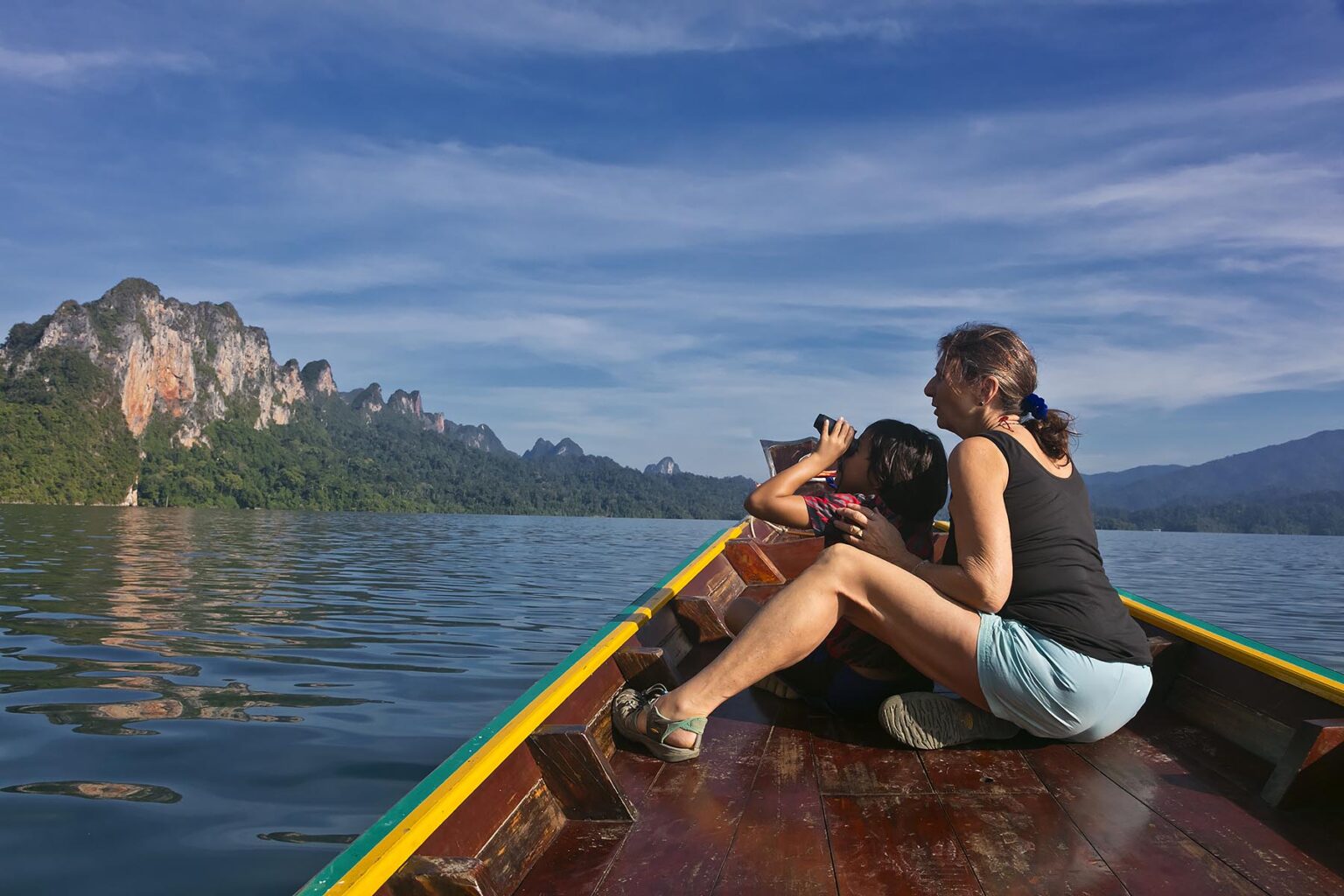 Visitors bird watch on CHEOW LAN LAKE in KHAO SOK NATIONAL PARK - THAILAND