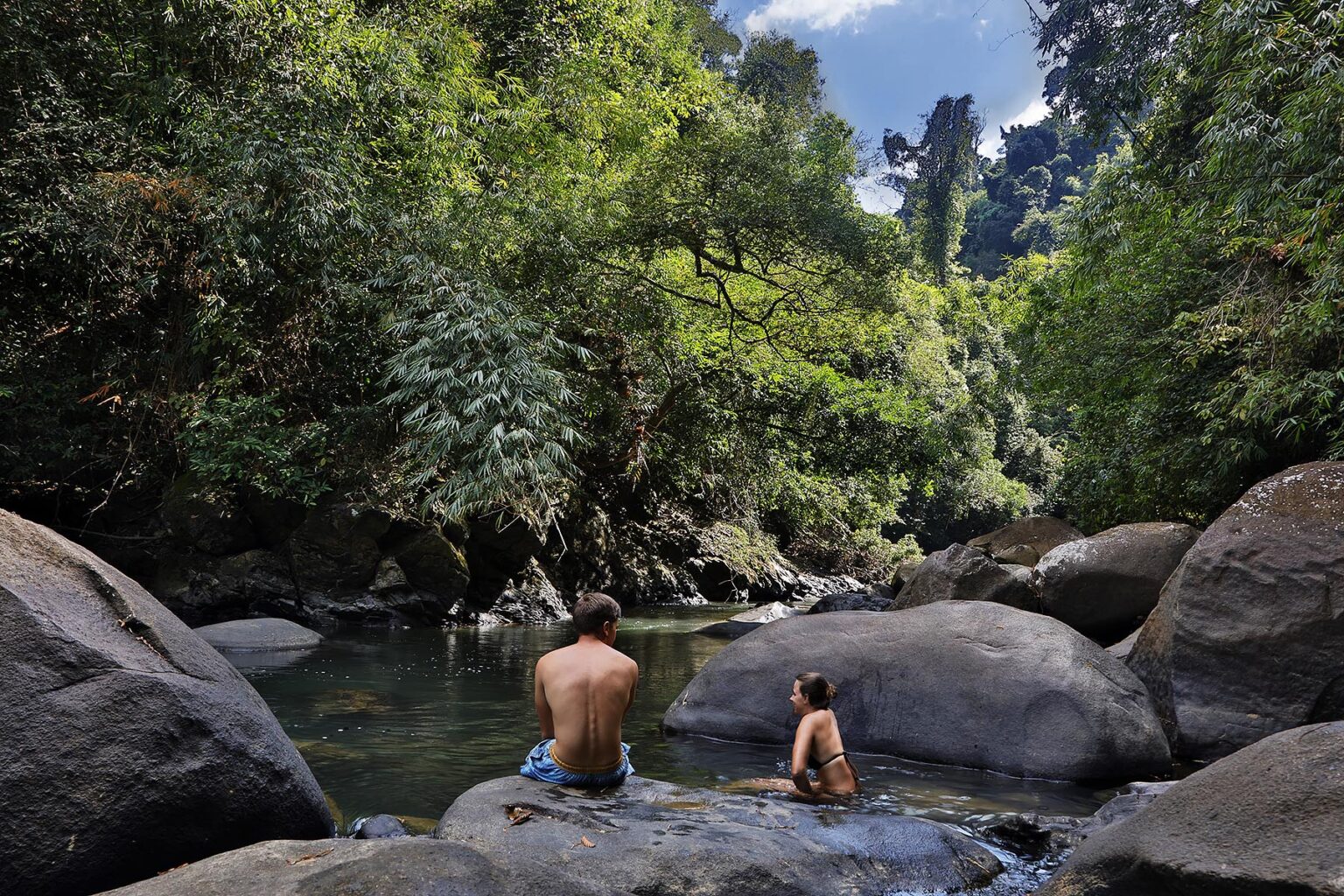 Swimming in the river in KHAO SOK NATIONAL PARK - KHAO SOK, THAILAND