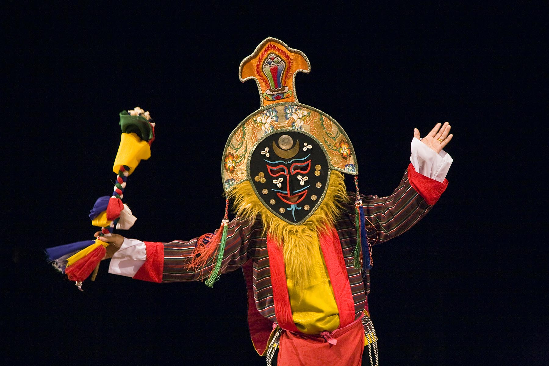 MASKED CHAM DANCER during TIBET NIGHT at a DALAI LAMA teaching in October 2007 sponsored by KUMBUM CHAMTSE LING and the TIBETAN CULTURAL CENTER - BLOOMINGTON, INDIANA