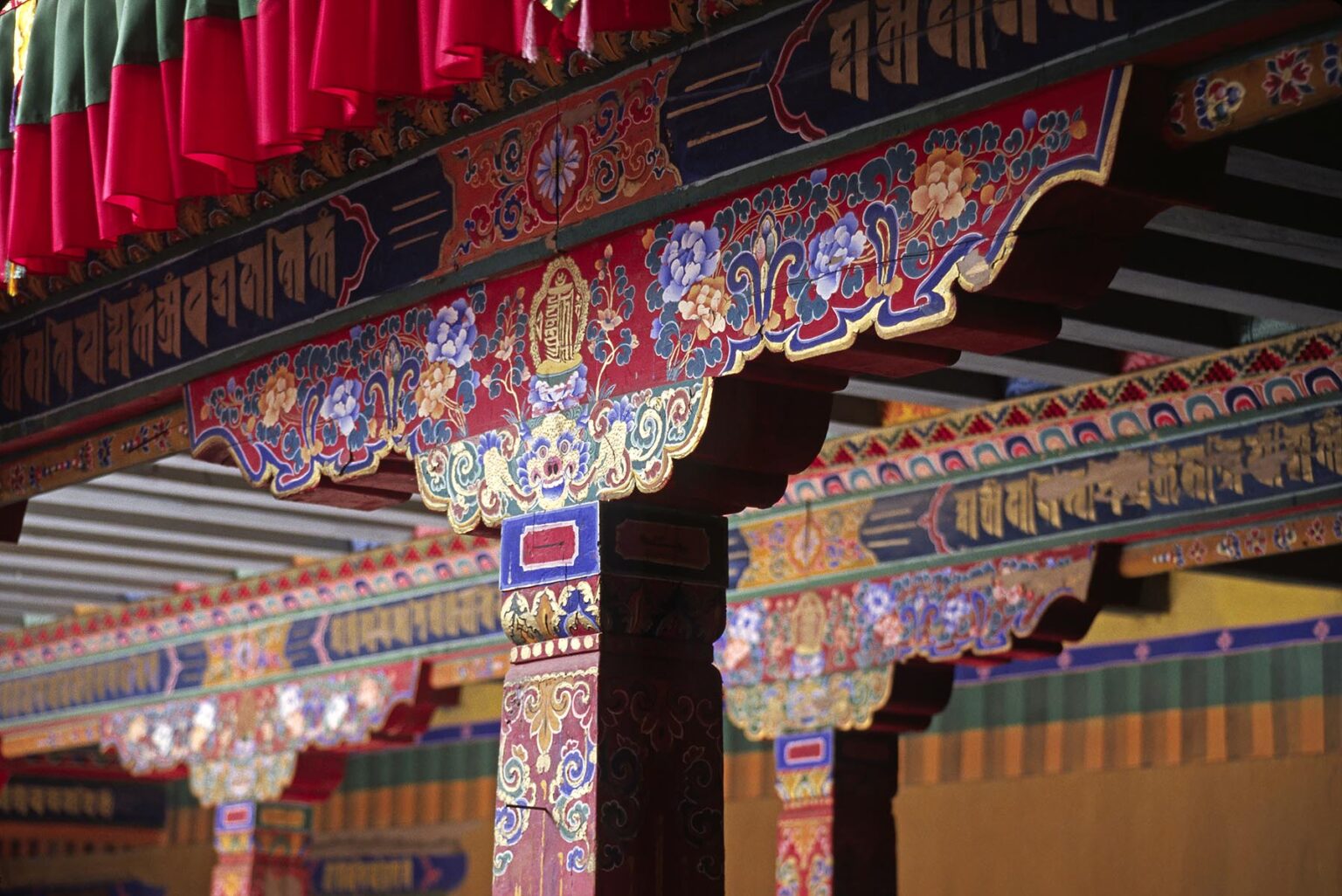 Newly painted support beams of TRANDRUK TEMPLE founded by KING SONGSTEN GAMPO in the 7th Century - YARLUNG VALLEY TIBET