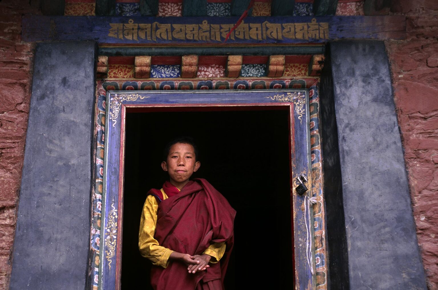 BUDDHIST MONK at TRANDRUK TEMPLE which was founded by KING SONGTSEN GAMPO in the 7TH Century - YARLUNG VALLEY, TIBET