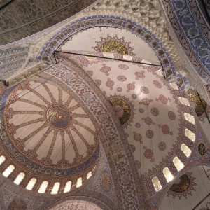 The beautifully painted interior domes of The Blue Mosque (Sultanahmet Camii) which was completed in 1616 - Istanbul, Turkey