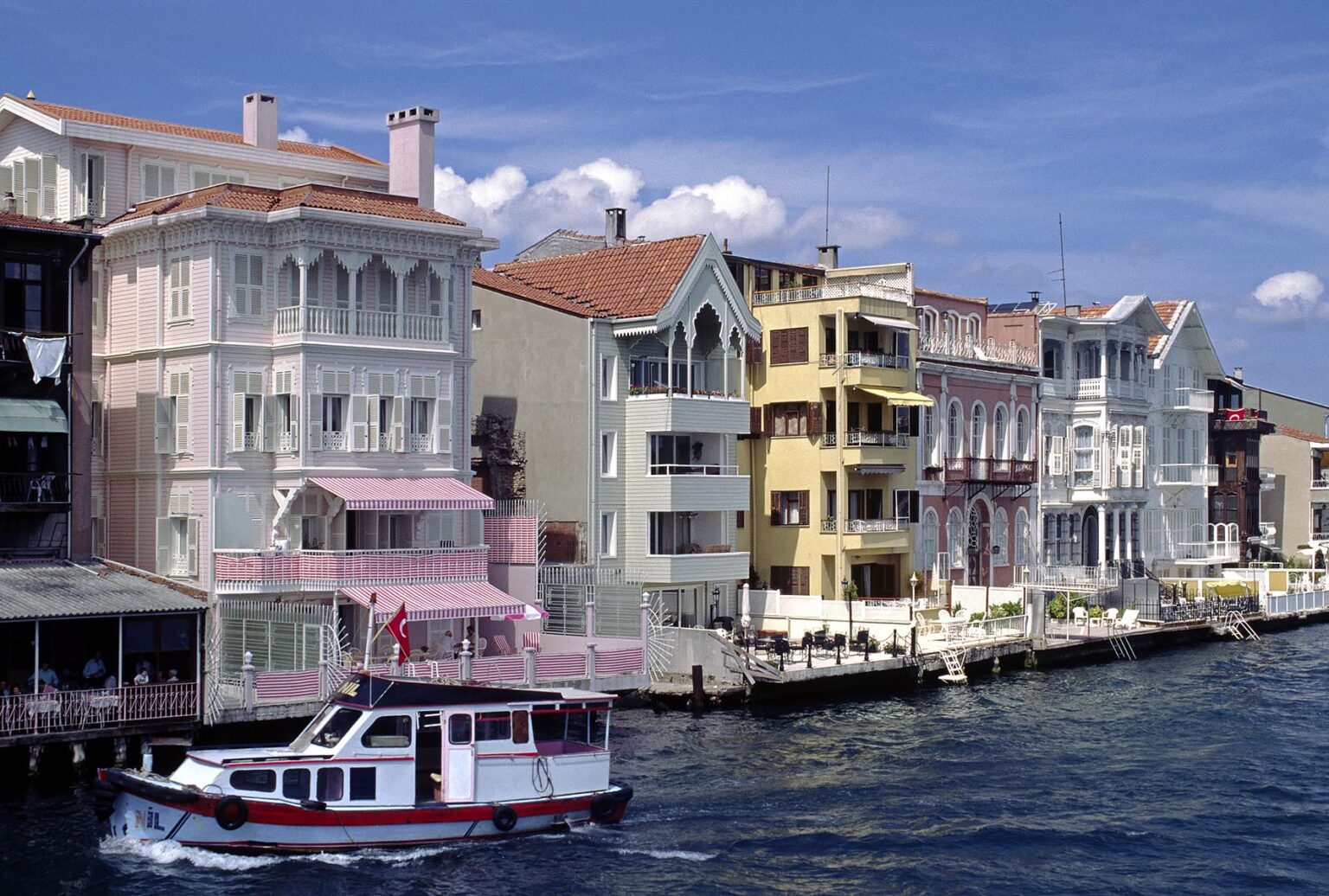 Luxury homes line the shore of  the BOSPHORUS (the waterway which joins the Mediterranean and the Black Sea) - Istanbul, turkey